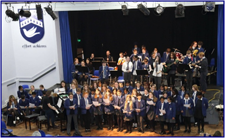 Students Performing at the Music Showcase Concert at the front of the stage in South Hall